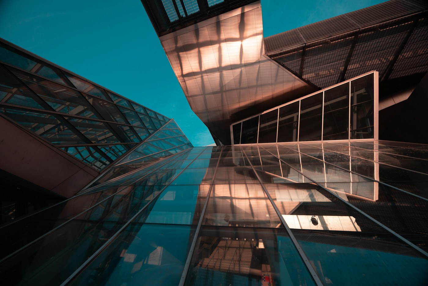 Futuristic glass-and-steel architecture, an illustrative technology campus placeholder