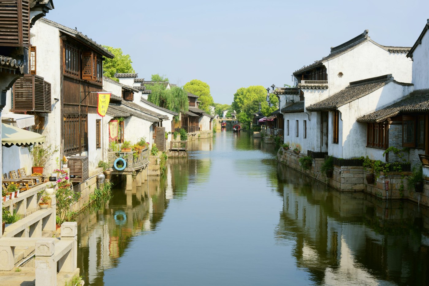 Traditional Jiangnan water town with a tranquil canal, a heritage placeholder